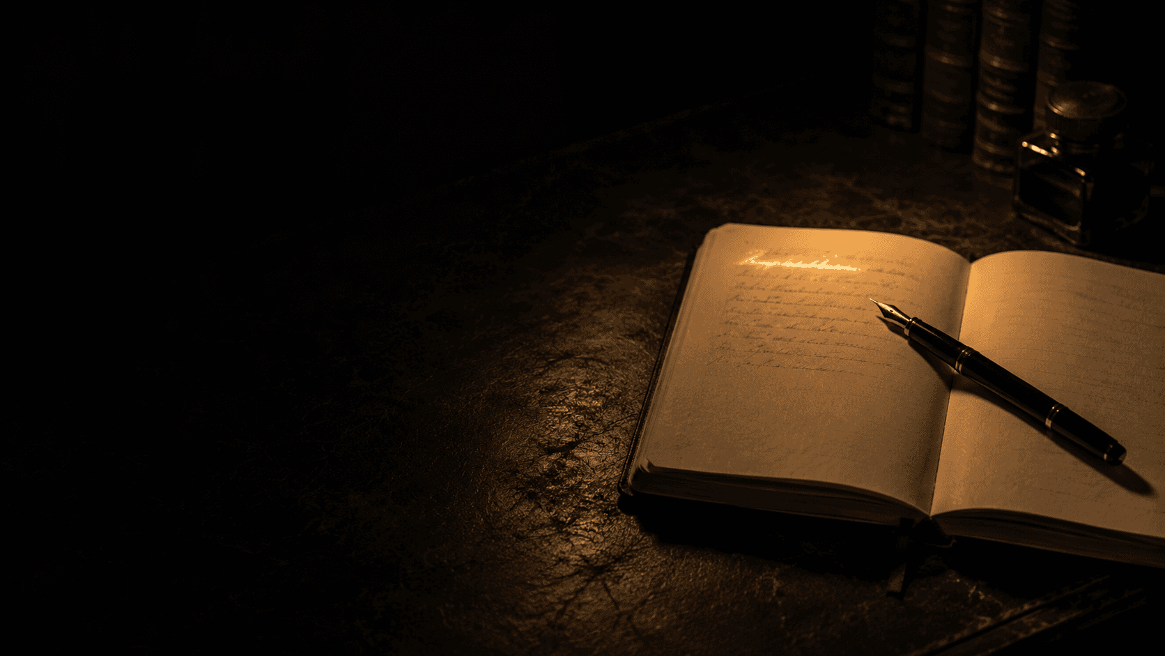 A dark desk with an open notebook and pen, one line lit in gold